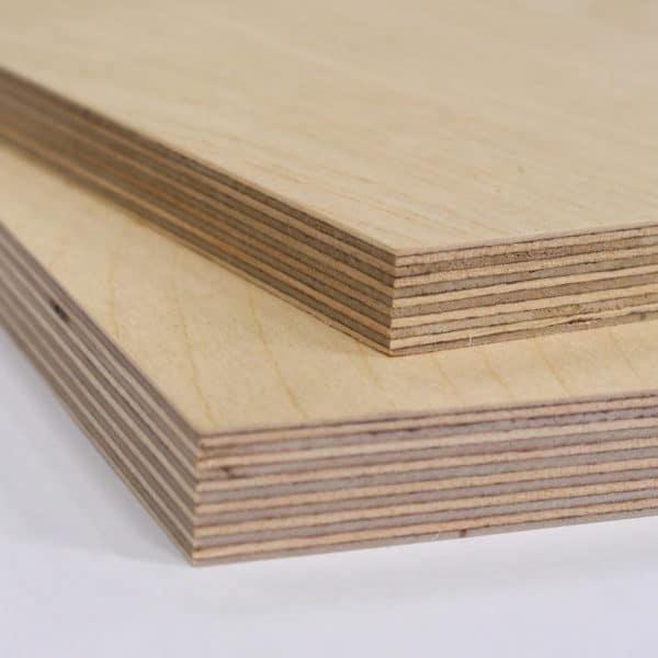 A composed photo showing tow piece of Birch Plywood cut to size and stacked on top of each other. The top piece is 12mm thick Birch Plywood, the bottom piece is 18mm thick Birch Plywood.