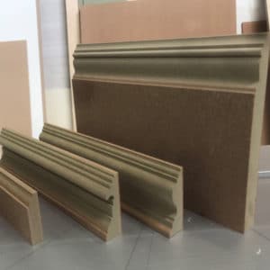 A selection of four MR MDF exact match Victorian mouldings from left to right a door stop picture rail architrave and 12" skirting