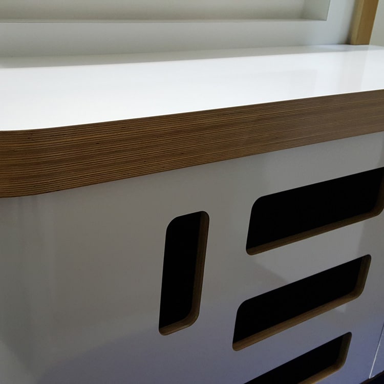 Bespoke display units made from Birch Plywood finished in a gloss white laminate