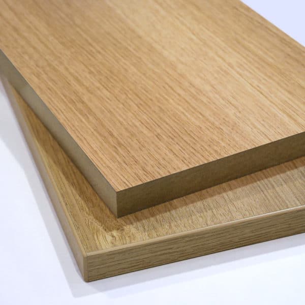 two pieces of natural oak melamine faced MDF cut to size online stacked on top of each other