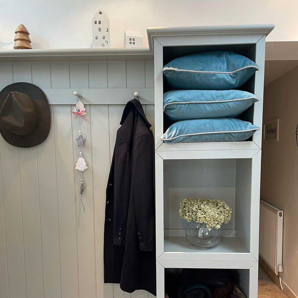 light blue painted bead and butt panelling in a bootroom