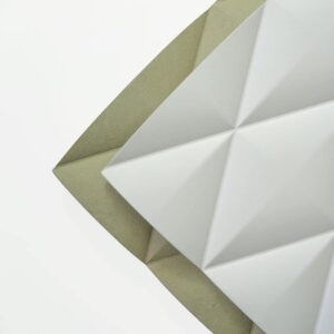 two large quilt effect panels stacked on top of each other, one primed and the other unprimed