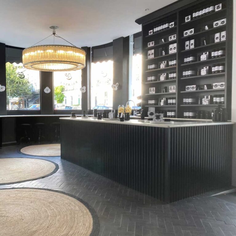 black dyed standard fluted mdf panelling used on a counter top in a shop