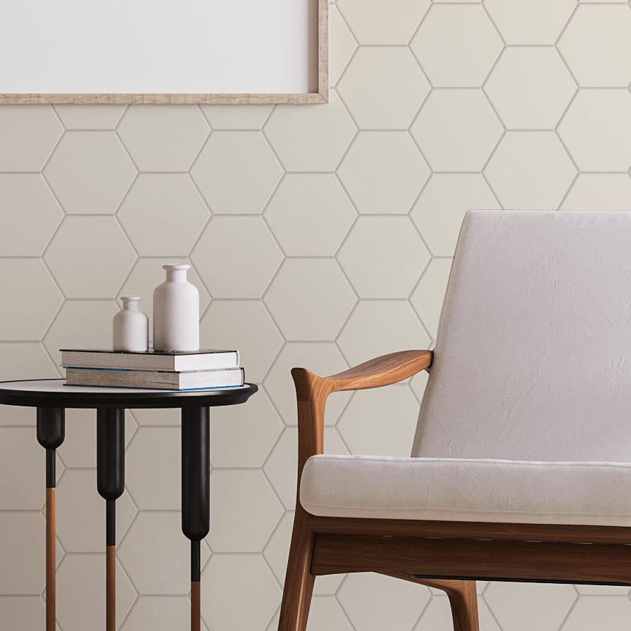 Hex Wall Panelling In Beige with a chair and a small coffee table in front