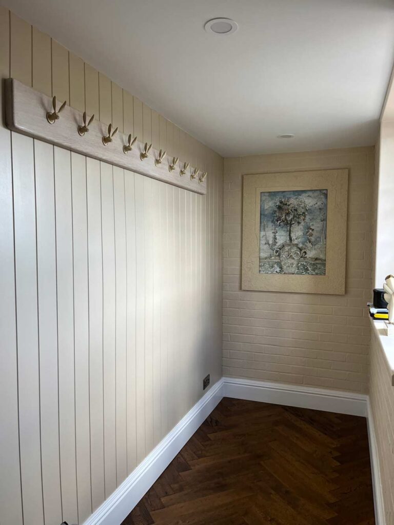 grooved cloak room wall in hallway
