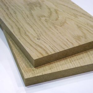 two Oak veneer mdf panels stacked on top of each other with a white background