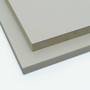 two finsa moisture resistant natural grey panels cut to size with one panel edged all round