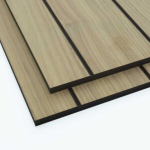 100mm groove pitch walnut faced tongue and groove panels stacked on top of each other