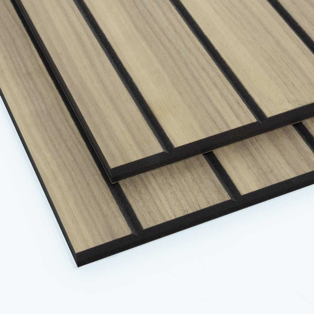 50mm groove pitch walnut faced tongue and groove panels stacked on top of each other