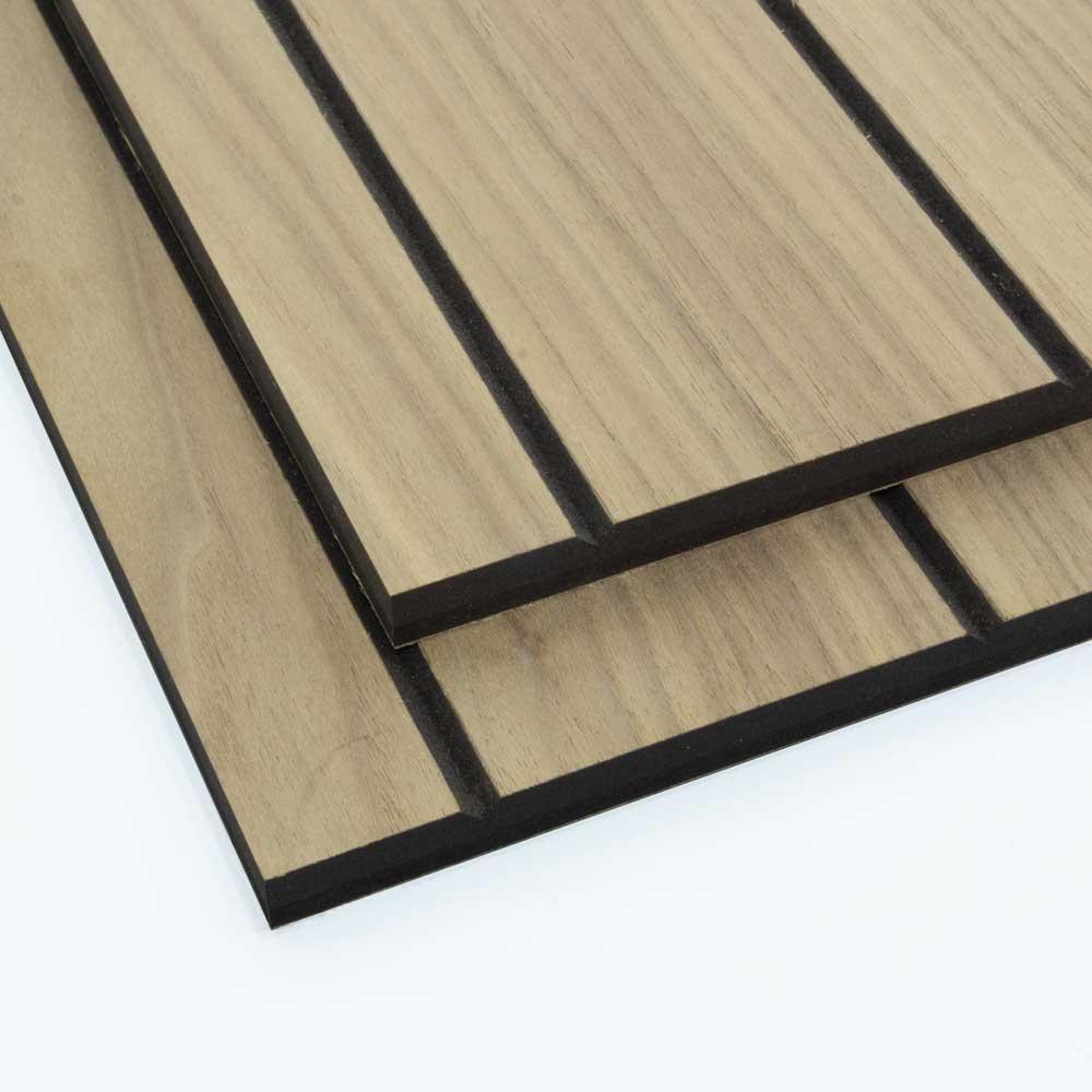 75mm groove pitch walnut faced tongue and groove panels stacked on top of each other