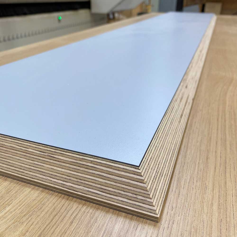 grey laminated birch plywood cnc routed on cnc machine