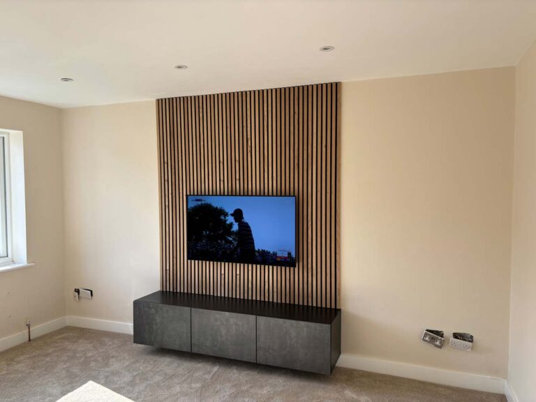 oak veneer faced slat wall panelling used for a media wall behind TV