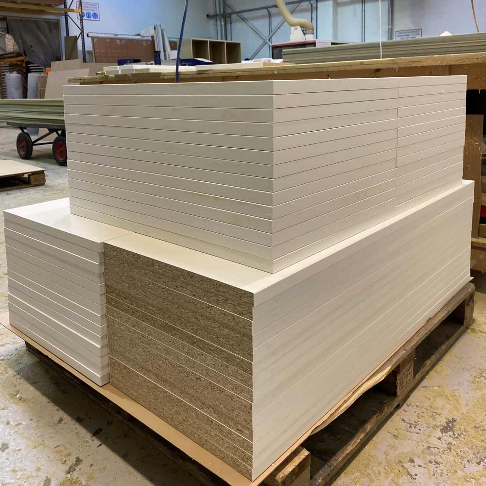 white melamine board cut to size and then edged