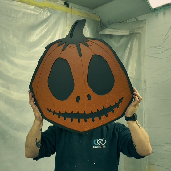 cut-out pumpkin using orange and black valchromat mdf
